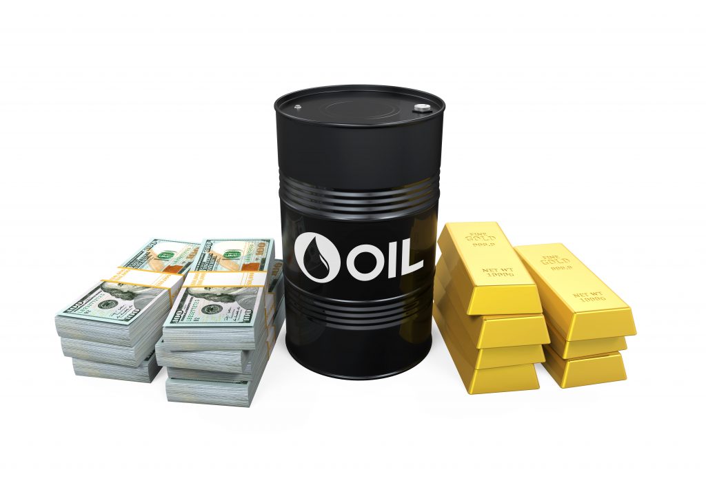 Oil pares losses, gold loses ground