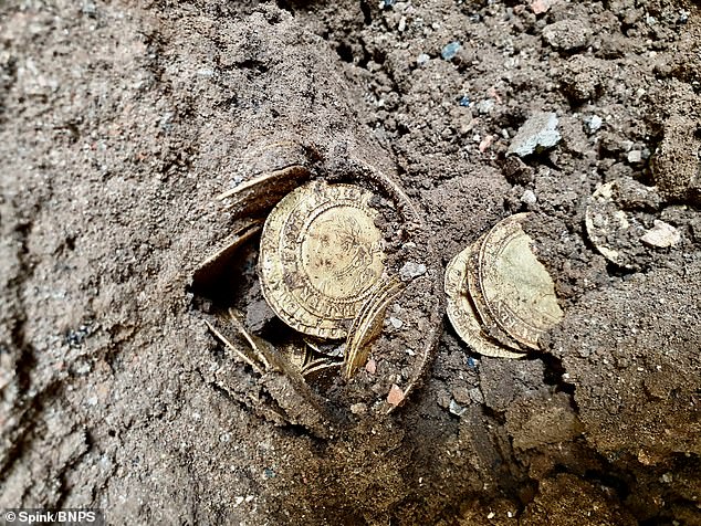 The gold coins pictured in the ground of the couple's kitchen floor in Ellerby