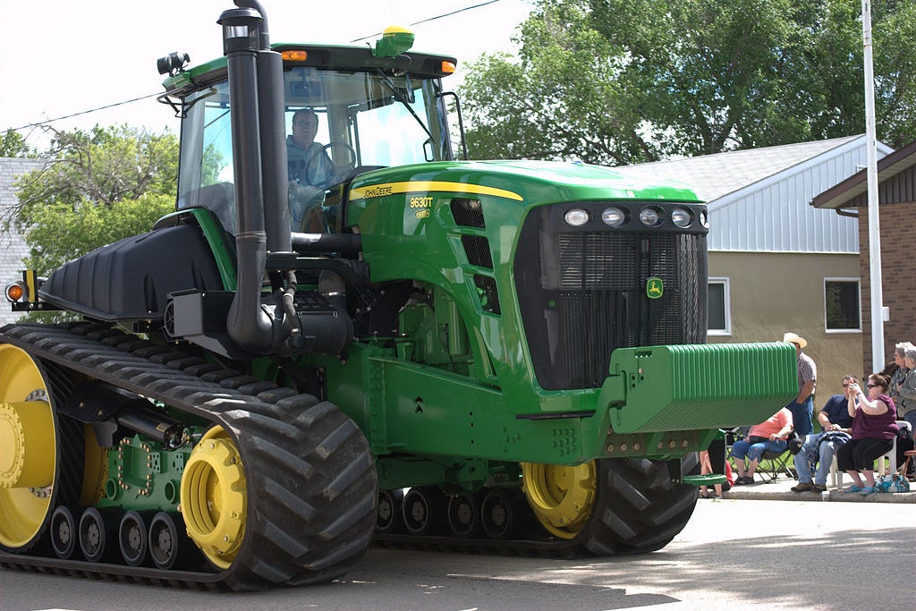 Deere (NYSE:DE) – Deere Invests Billions In Self-Driving Tractors, Smart Crop Sprayers: Report